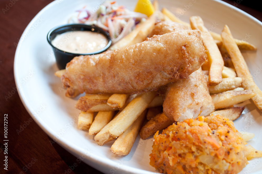 Scottish style fish and chips with homemade clapshot, fries and coleslaw. Scottish style fish and chips with homemade clapshot, fries and coleslaw.