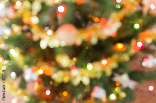 blur light celebration on christmas tree