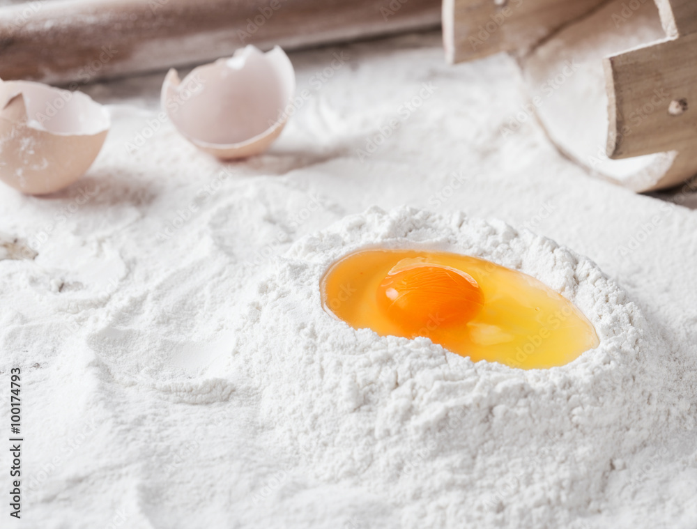 baking background, flour, egg and rolling pin baking background, flour, egg and rolling pin