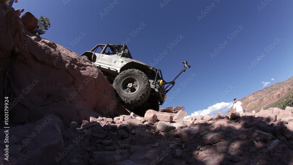 Jeep Going Down and Back up a Ledge
