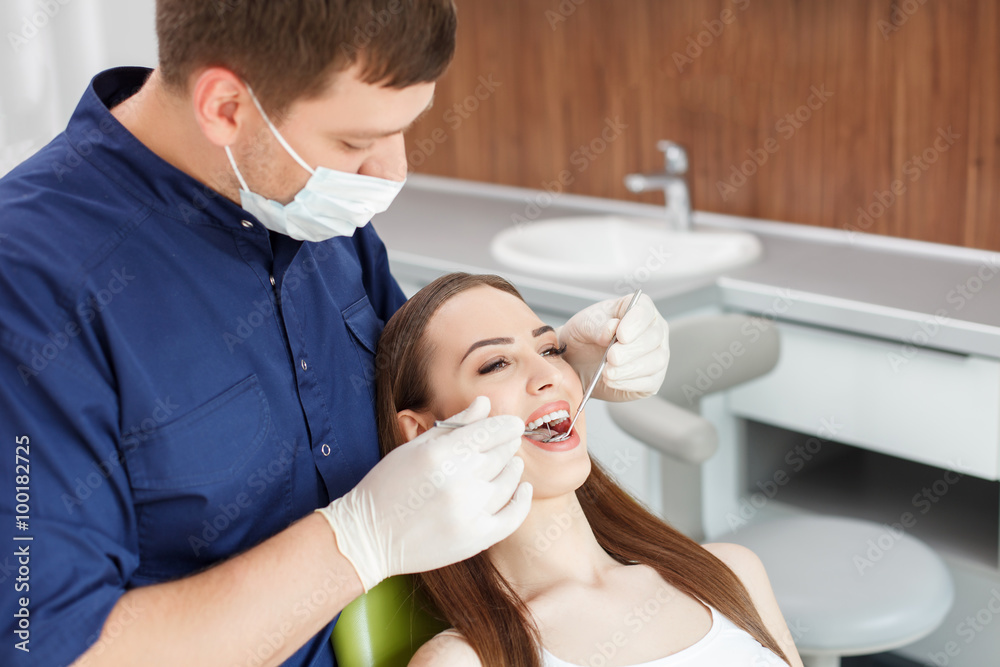 Beautiful young girl came to see a dental doctor Beautiful young girl came to see a dental doctor