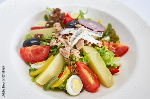 Tuna salad on white plate studio shot