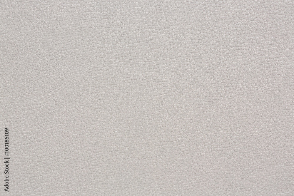 Beige coloured faux leather. Closeup. Background Beige coloured faux leather. Closeup. Background