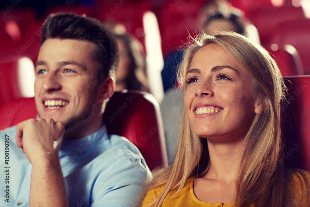 happy friends watching movie in theater happy friends watching movie in theater