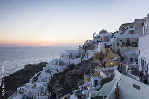 View of Oia traditional white houses of Oia at sunset in Santori