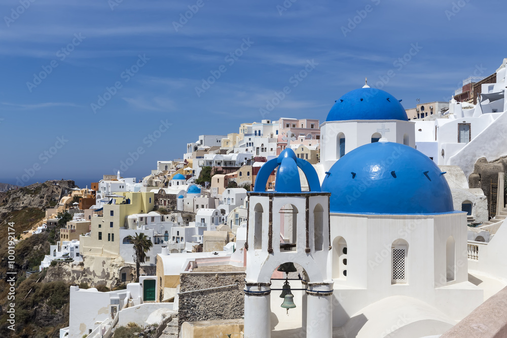 Blue domed churches on the Caldera at Oia on the Greek Island of