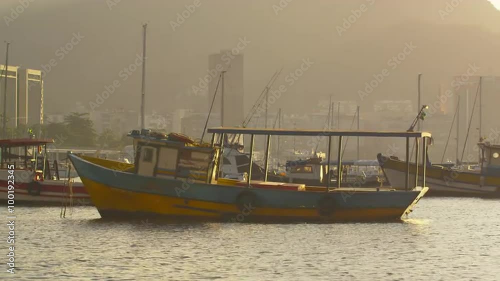 Static shot of a lone boat floating in Guanabara Bay. Static shot of a lone boat floating in Guanabara Bay.