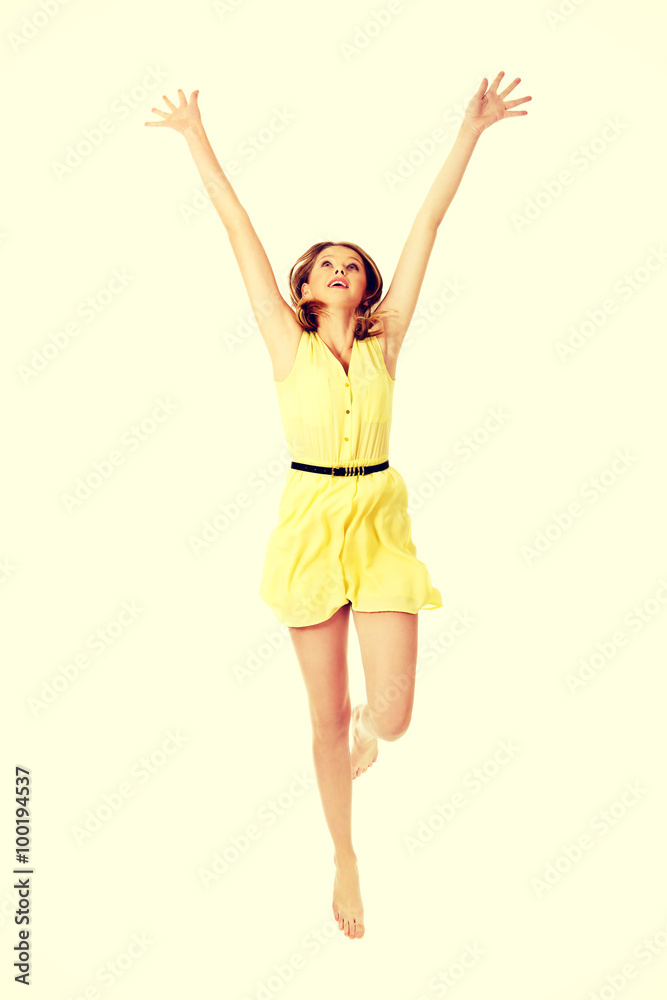 Young caucasian woman jumping