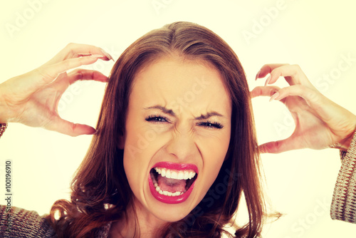 Angry woman screaming.