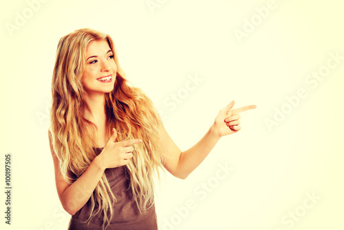 Student woman pointing to the right