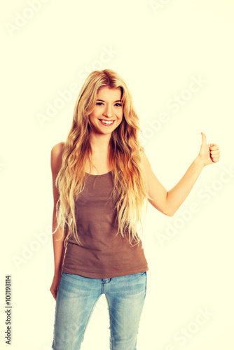 Student woman showing thumb up