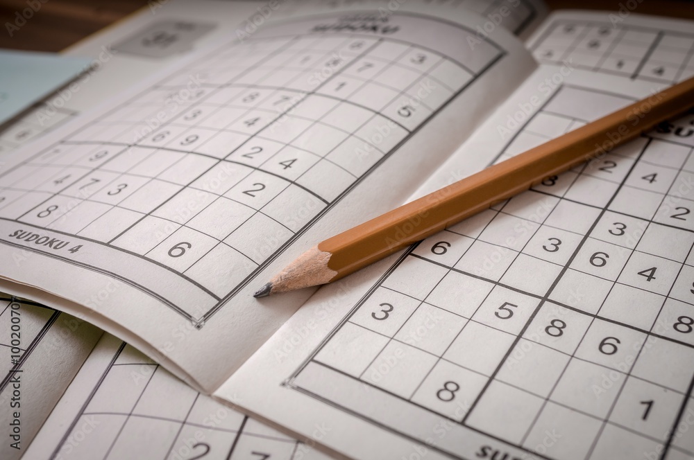 Pencil and sudoku crosswords. Stock Photo Adobe Stock
