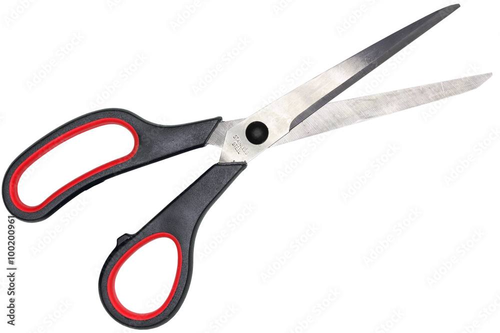 Single red-black steel scissors. Isolated on white background. Close-up. Studio photography. Single red-black steel scissors. Isolated on white background. Close-up. Studio photography.