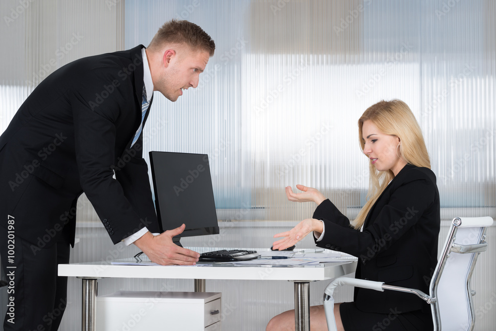 Businessman Blaming Employee In Office Businessman Blaming Employee In Office