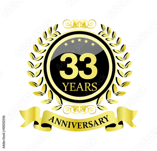 33 anniversary with glossy golden wreath and ribbon 