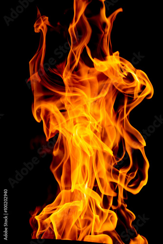 yellow Fire flame isolated on black background