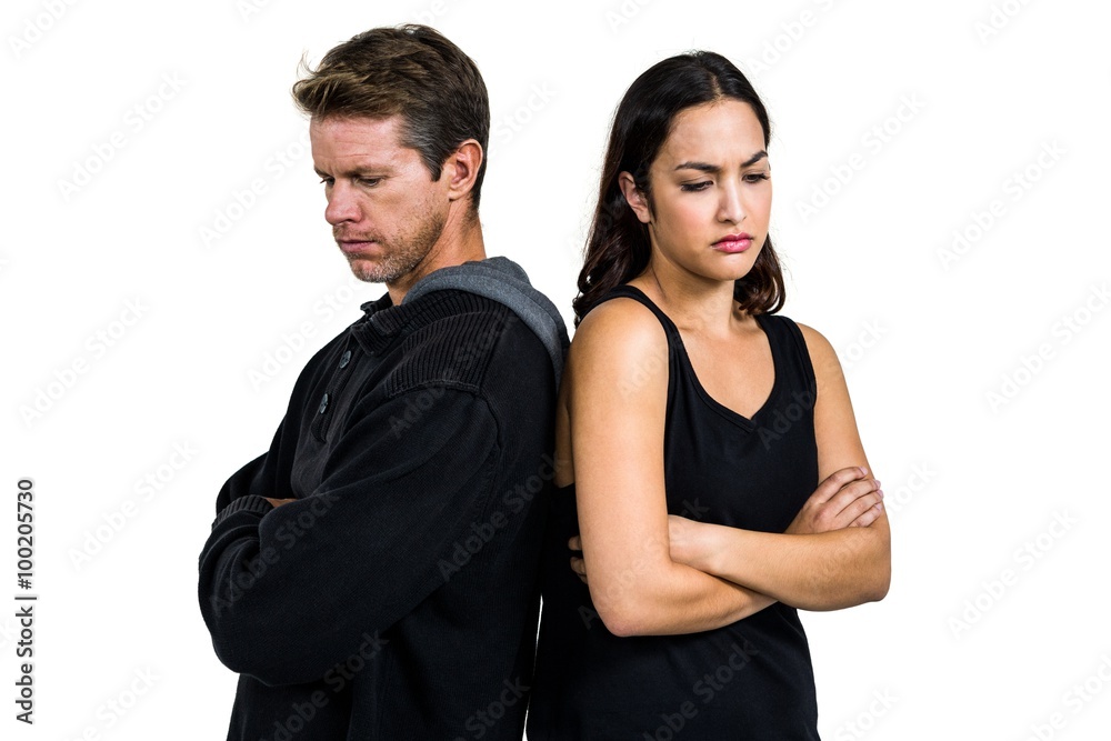 Angry couple standing over white background Angry couple standing over white background