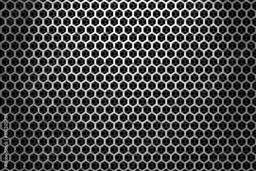 Black iron speaker grid texture. Industrial background.