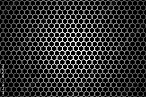 Black iron speaker grid texture. Industrial background.