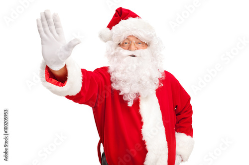 Santa Claus making a stop gesture