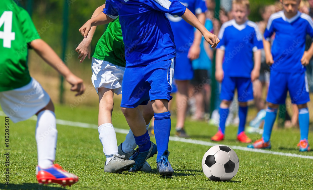 Football match for children. Young boys playing soccer game. Football match for children. Young boys playing soccer game.