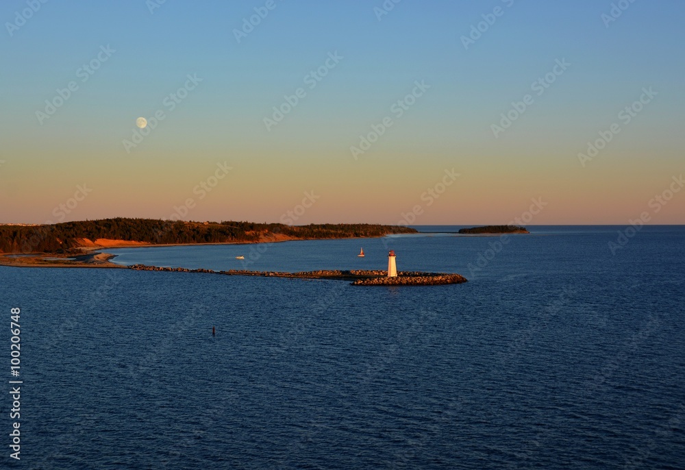 view of the Lighthouse on McNabs island near Halifax Nova Scotia, Canada, sunse