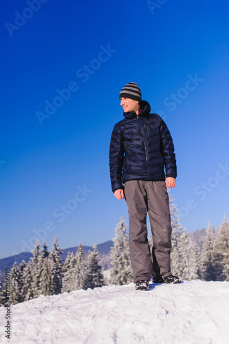 Man stands on ski slope