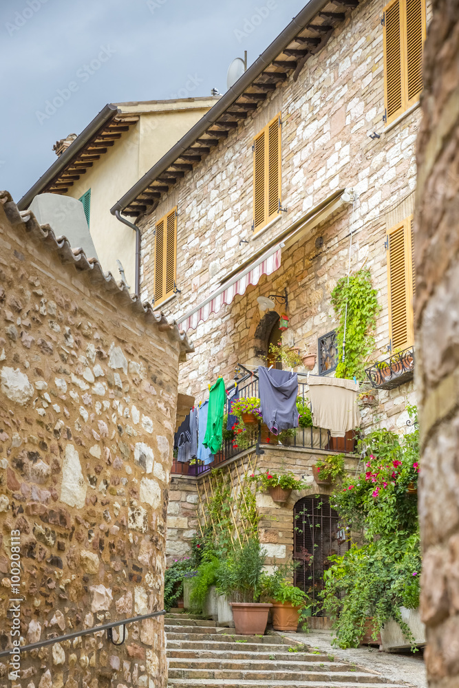 Narrow streets of the medieval village of Spello in Umbria (Italy)
Narrow streets of the medieval village of Spello in Umbria (Italy)