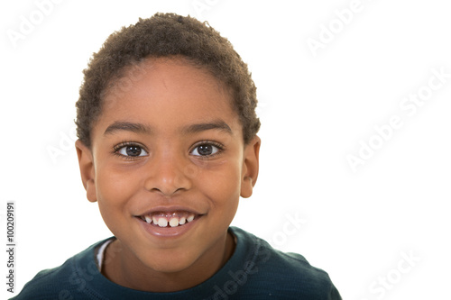 Happy school aged boy isolated on white