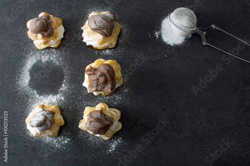 Wallpaper Mural Fresh profiteroles with cream and chocolate frosting
 Torontodigital.ca