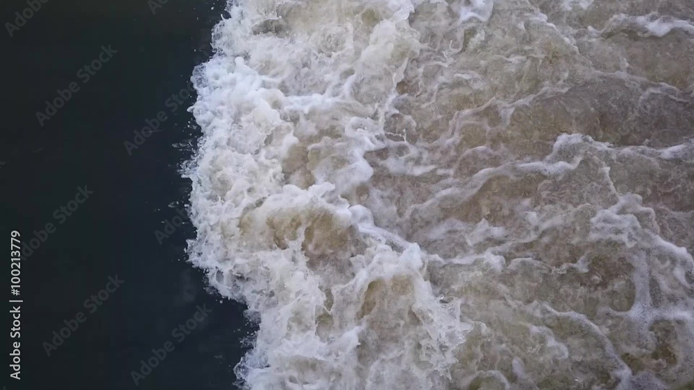 Foam on dirty water, whirlpool on river. Environment and waste management. Foam on dirty water, whirlpool on river. Environment and waste management.