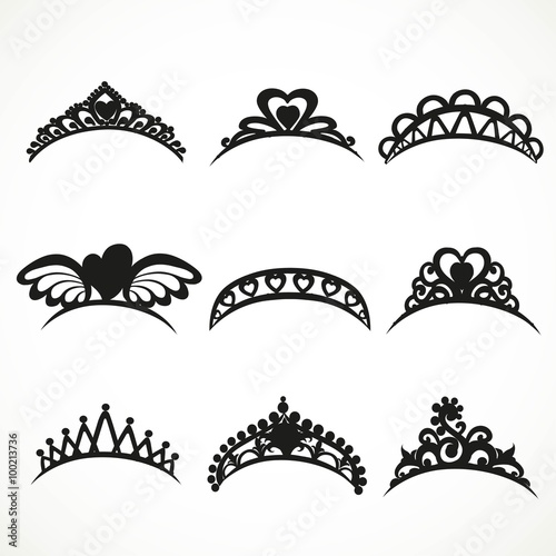 Set silhouettes of tiaras of various shapes isolated on a white