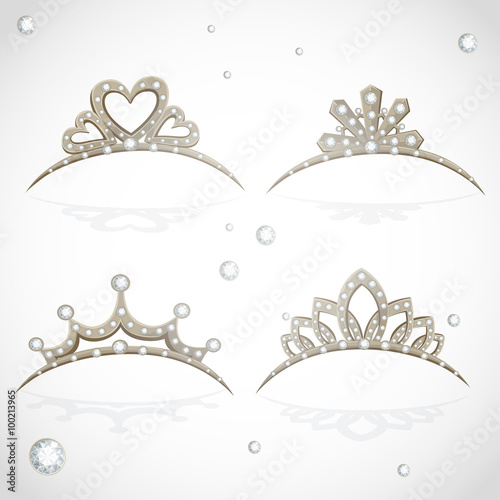 Shining gold tiaras with diamonds isolated on a white background