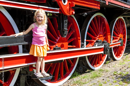 little girl in railway museum, Koscierzyna, Pomerania, Poland photo