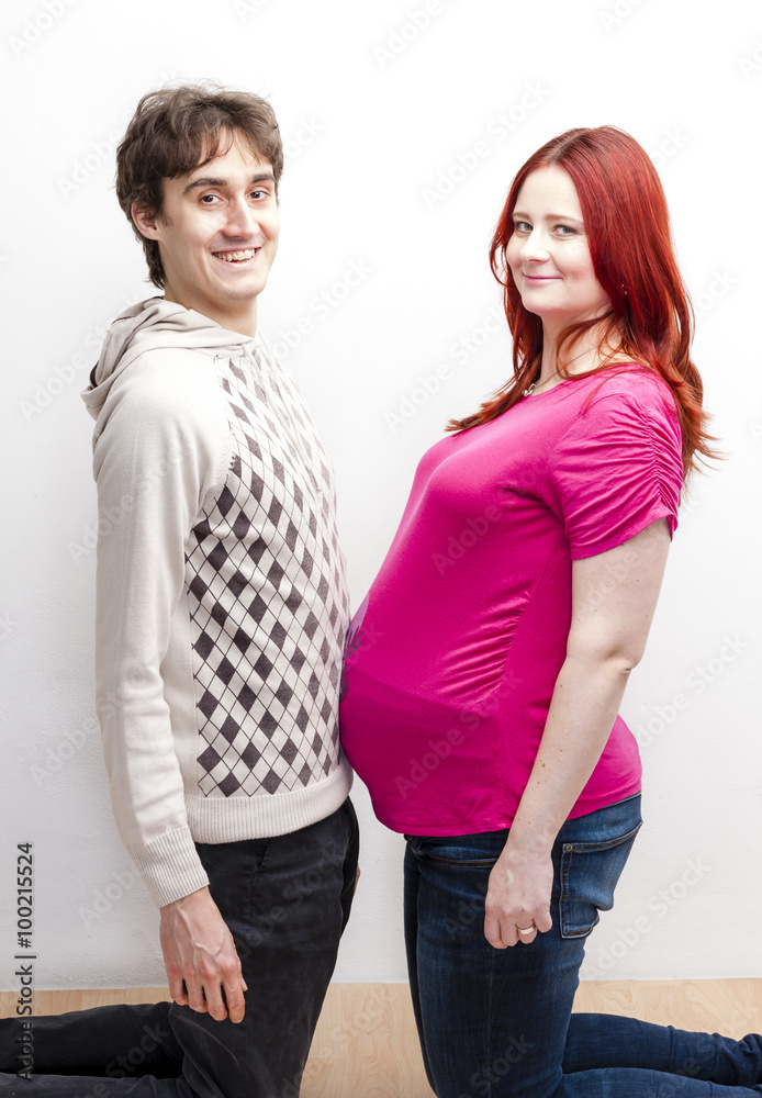 portrait of pregnant woman with her husband