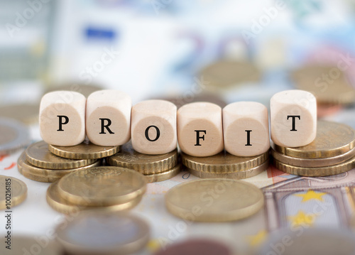 Quadro em tela Profit Schriftzug Würfel auf Geld