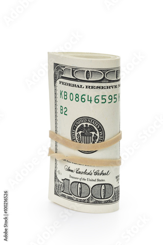 bunch of hundred dollar bills tied with rubber band