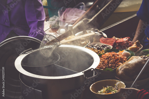 Photography Food in Damnoen Saduak Floating Market near Bangkok, Thailand