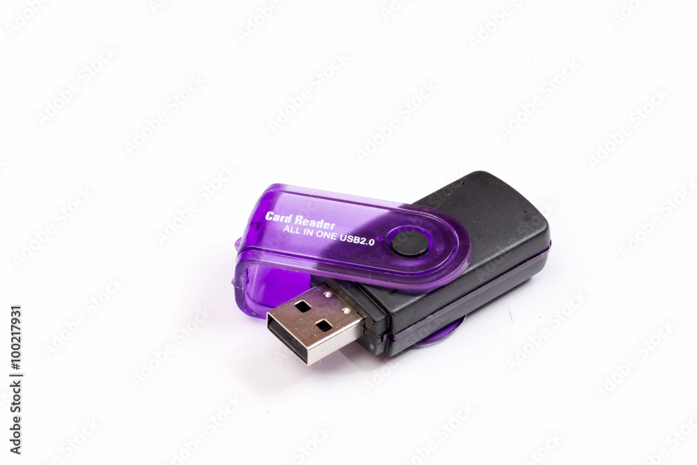 Black plastic memory card reader over white Black plastic memory card reader over white