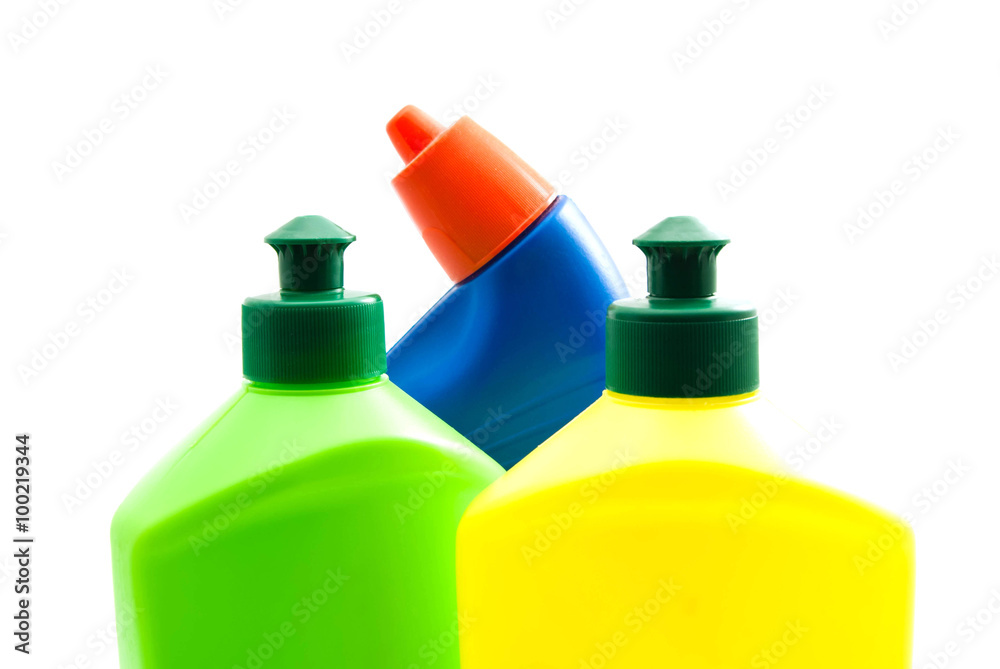 three colored bottles of detergent closeup three colored bottles of detergent closeup