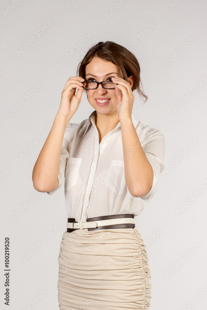 Adult business woman hold glasses in her hand