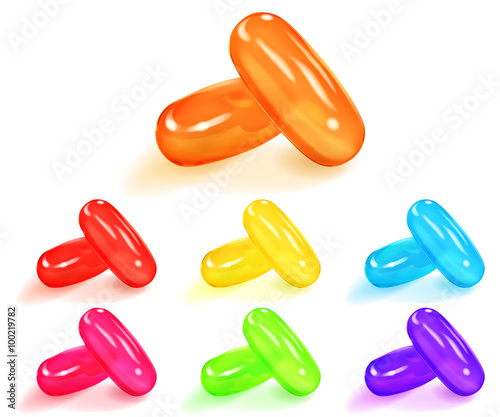 Set of multicolored capsules with shadows on white background
