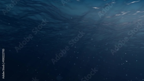 Looped view from underwater of calm ocean. FullHD seamless background.