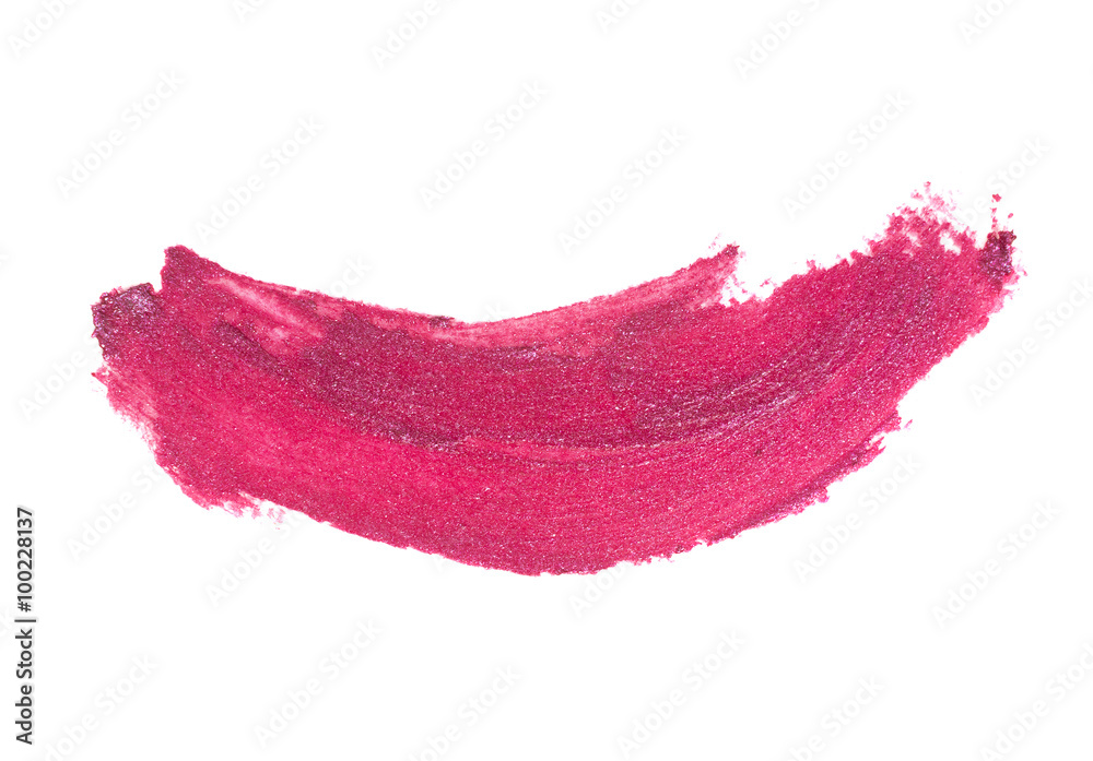 Pink lipstick stroke on white paper