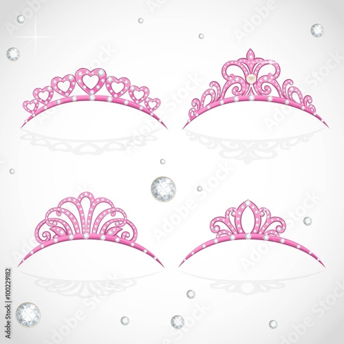 Elegant shiny pink tiara with precious stones isolated on white