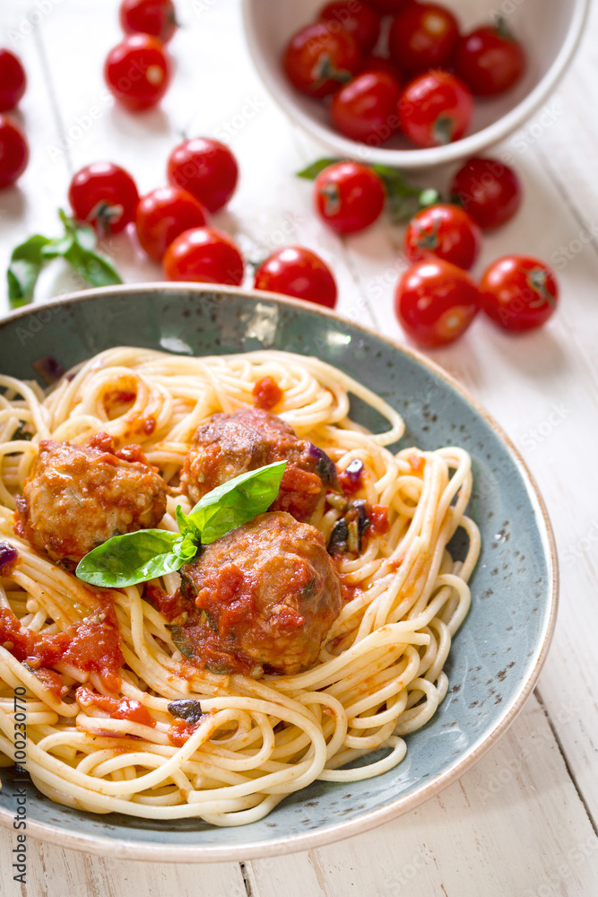 Spaghetti with meatballs and tomato sauce on a plate Spaghetti with meatballs and tomato sauce on a plate