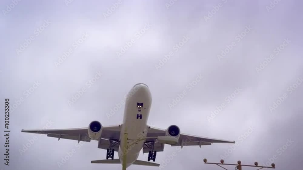 Airplane landing arriving at an airport, LAX, Los Angelos Airplane landing arriving at an airport, LAX, Los Angelos