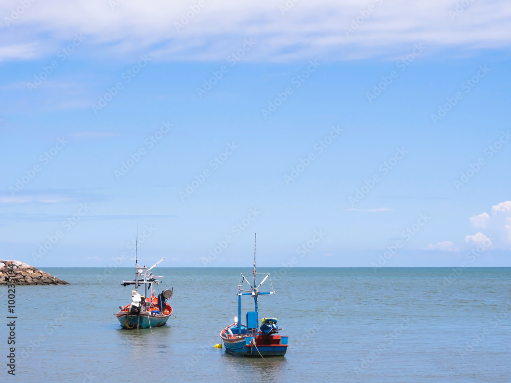 Small fishing boat floating