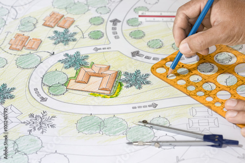 Landscape Architect Designs Blueprints For Resort.