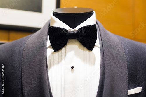 Bow tie on tuxedo suit in shop
